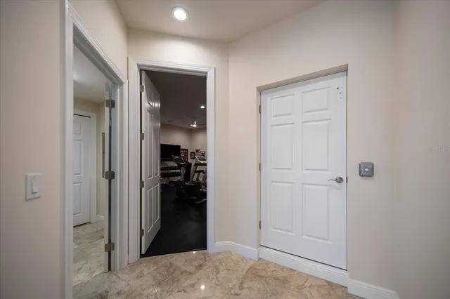 a bathroom with a granite countertop sink a mirror a vanity and a shower