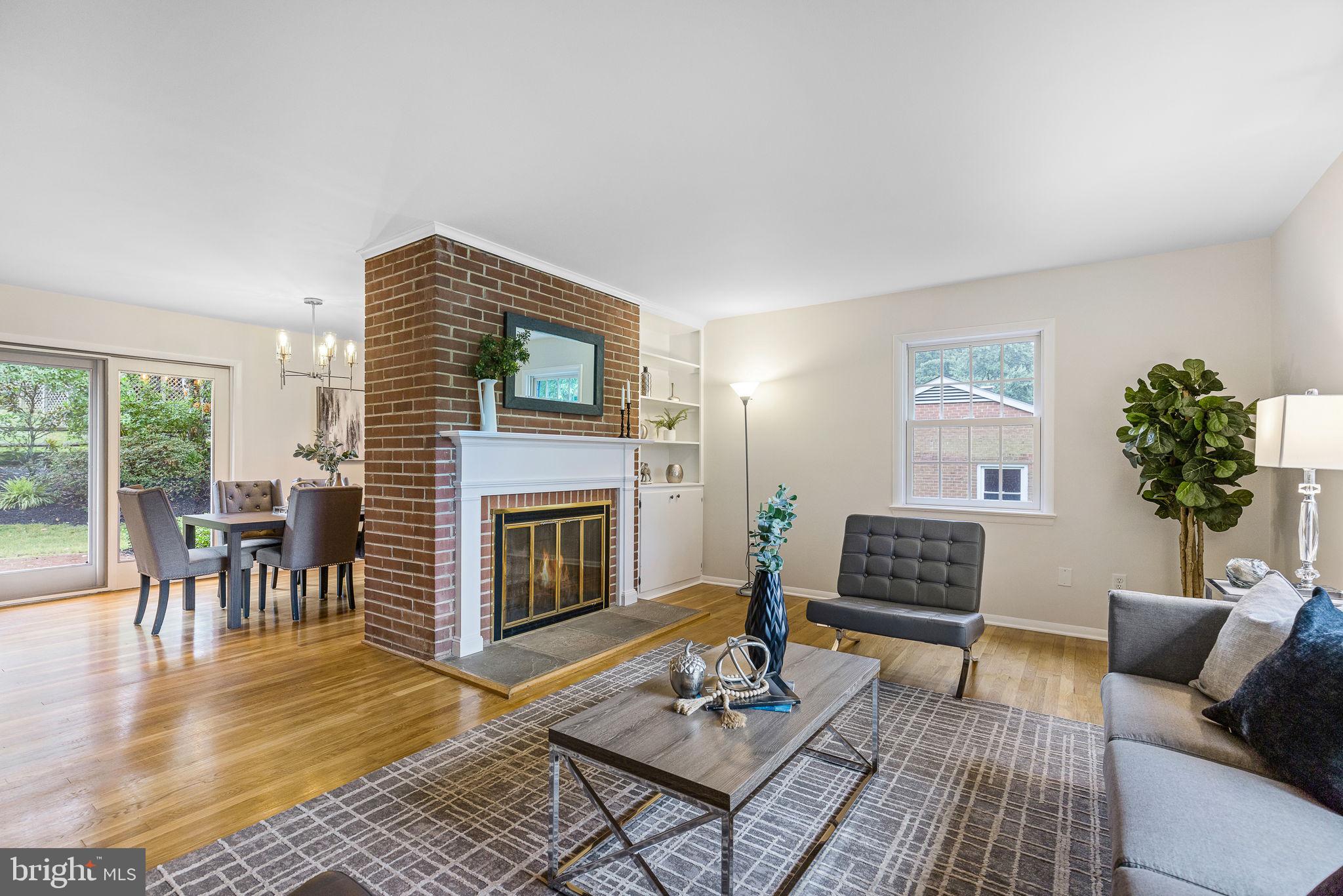 7809 Greeley Boulevard Springfield, VA 22152 - Photo 11 of 52 Living room with fireplace, window overlooks park!