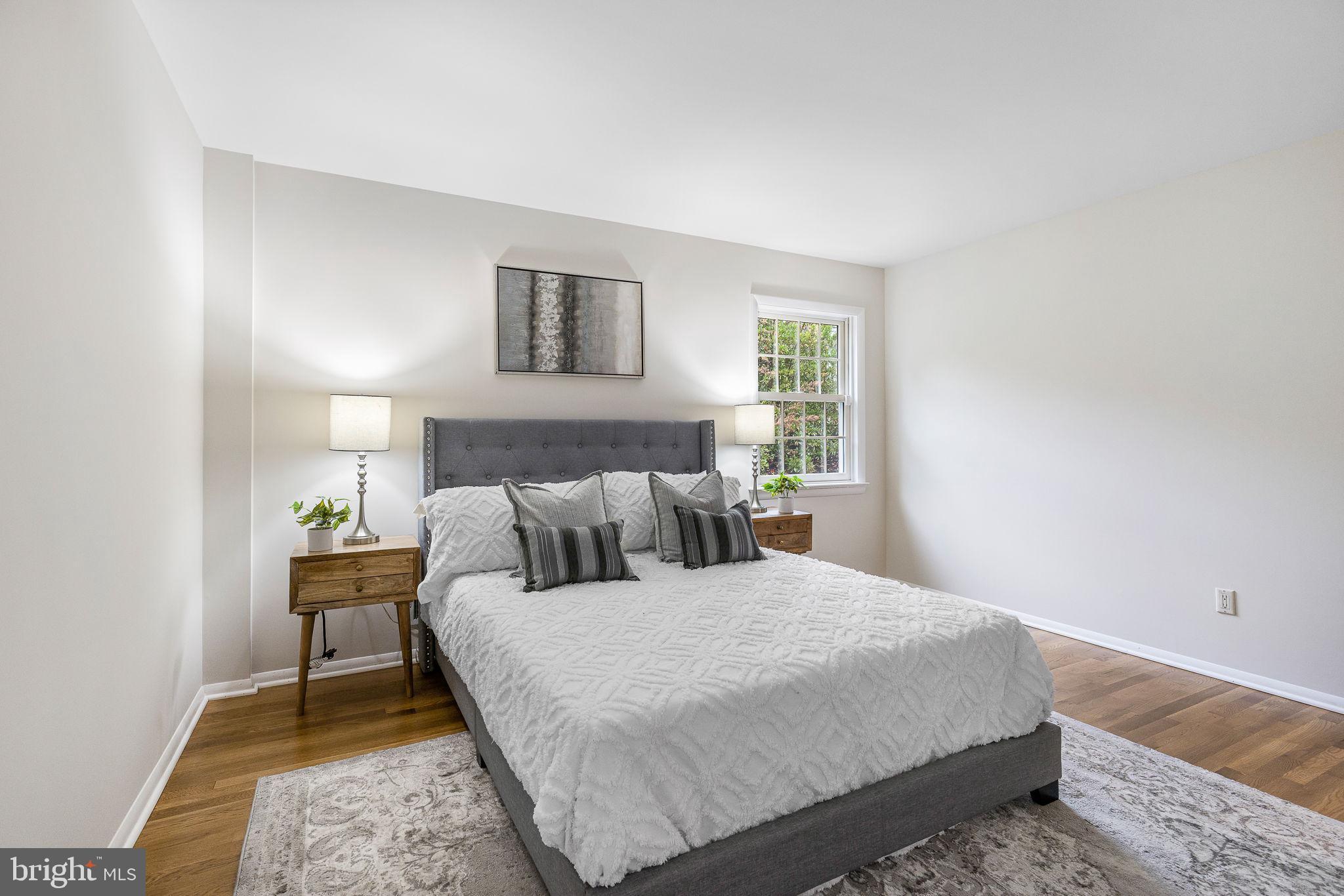7809 Greeley Boulevard Springfield, VA 22152 - Photo 23 of 52 Ensuite primary with hardwood floors