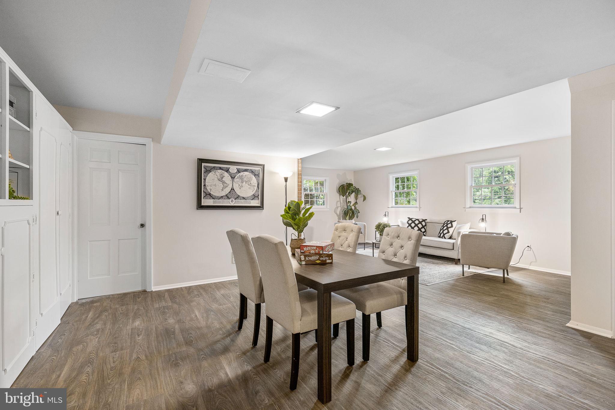 7809 Greeley Boulevard Springfield, VA 22152 - Photo 35 of 52 Expansive family room, new floors, built-ins & fp
