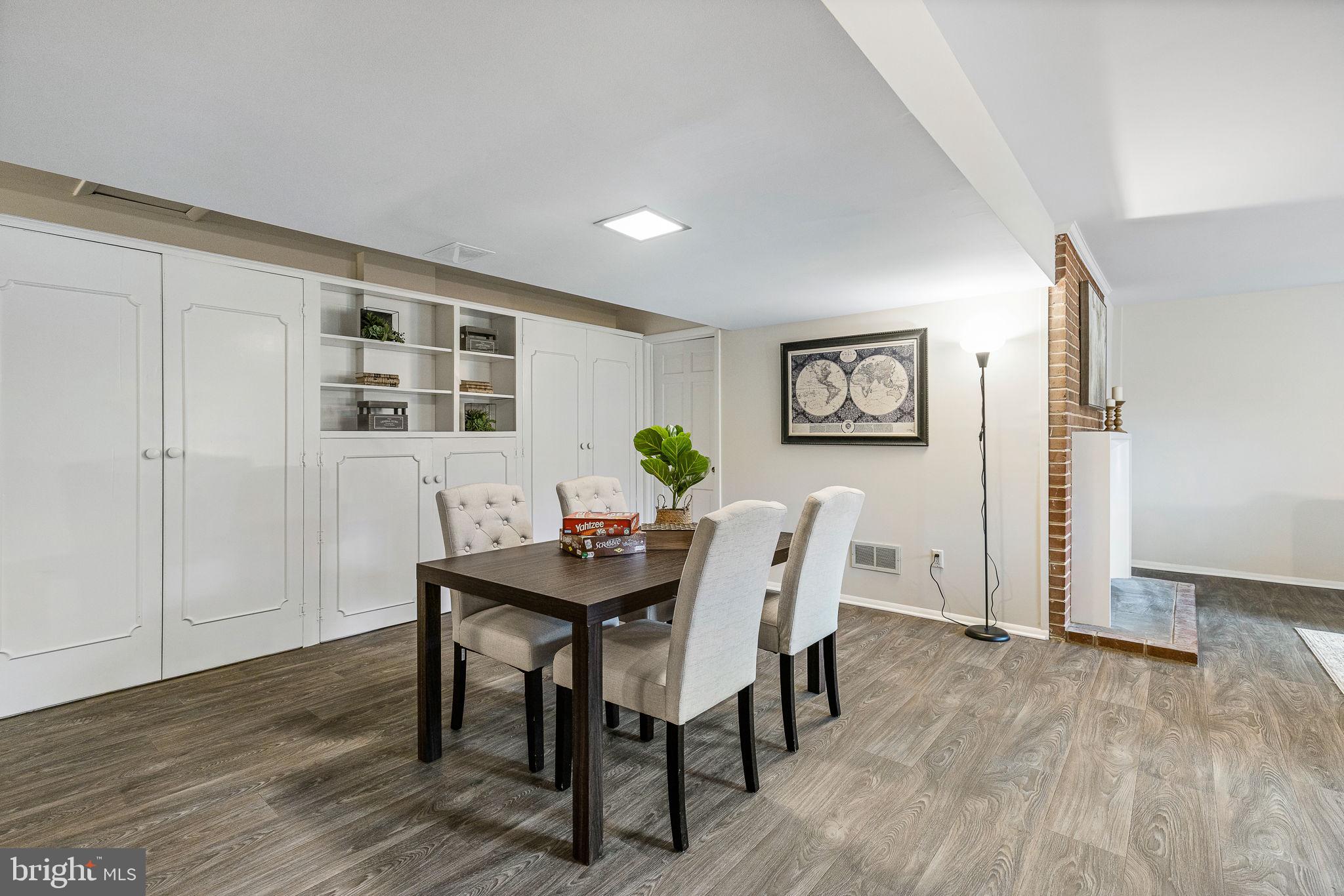 7809 Greeley Boulevard Springfield, VA 22152 - Photo 36 of 52 Expansive family room, new floors, built-ins & fp