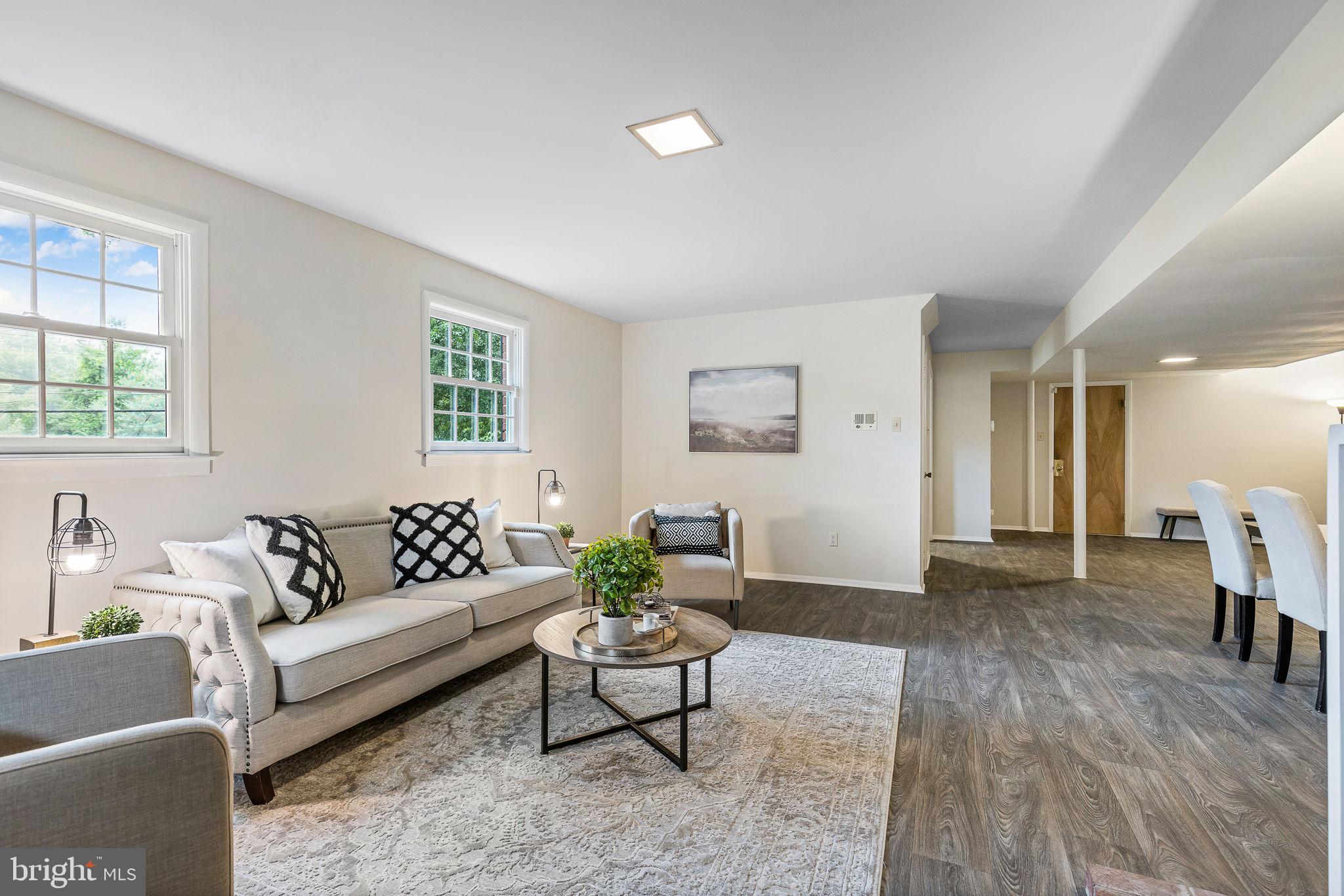 7809 Greeley Boulevard Springfield, VA 22152 - Photo 39 of 52 Expansive family room, new floors, built-ins & fp