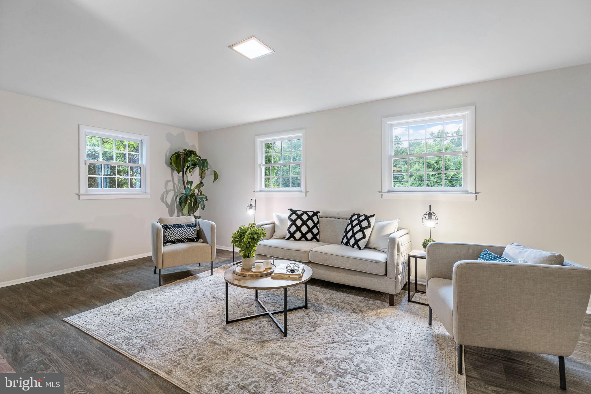 7809 Greeley Boulevard Springfield, VA 22152 - Photo 6 of 52 Expansive family room, new floors, built-ins & fp