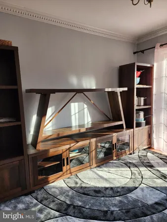 a room with a table and chairs