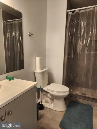 a bathroom with a sink and a toilet
