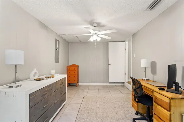 a spacious bathroom with a double vanity sink and a mirror