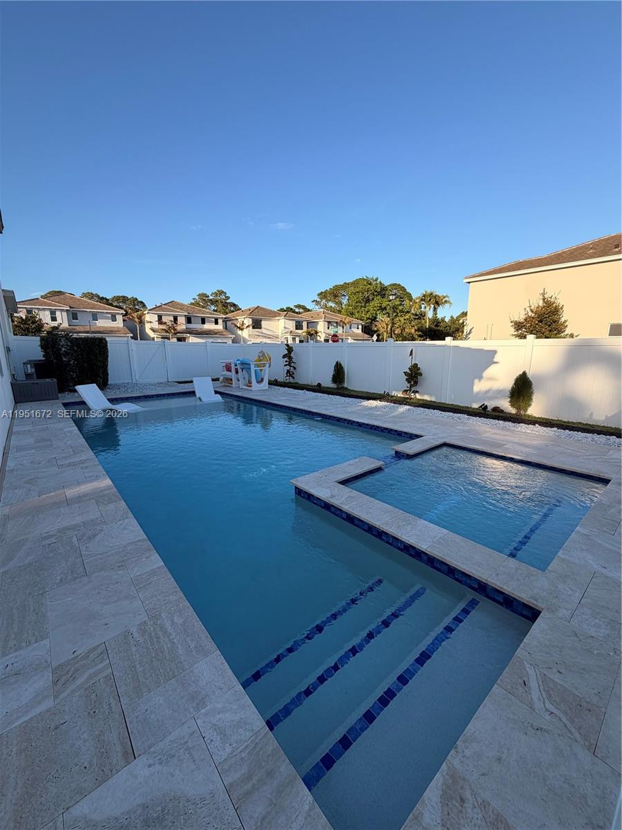 7126 Rockwood Road Jupiter, FL 33458 - Photo 8 of 35 a view of a balcony with an ocean view