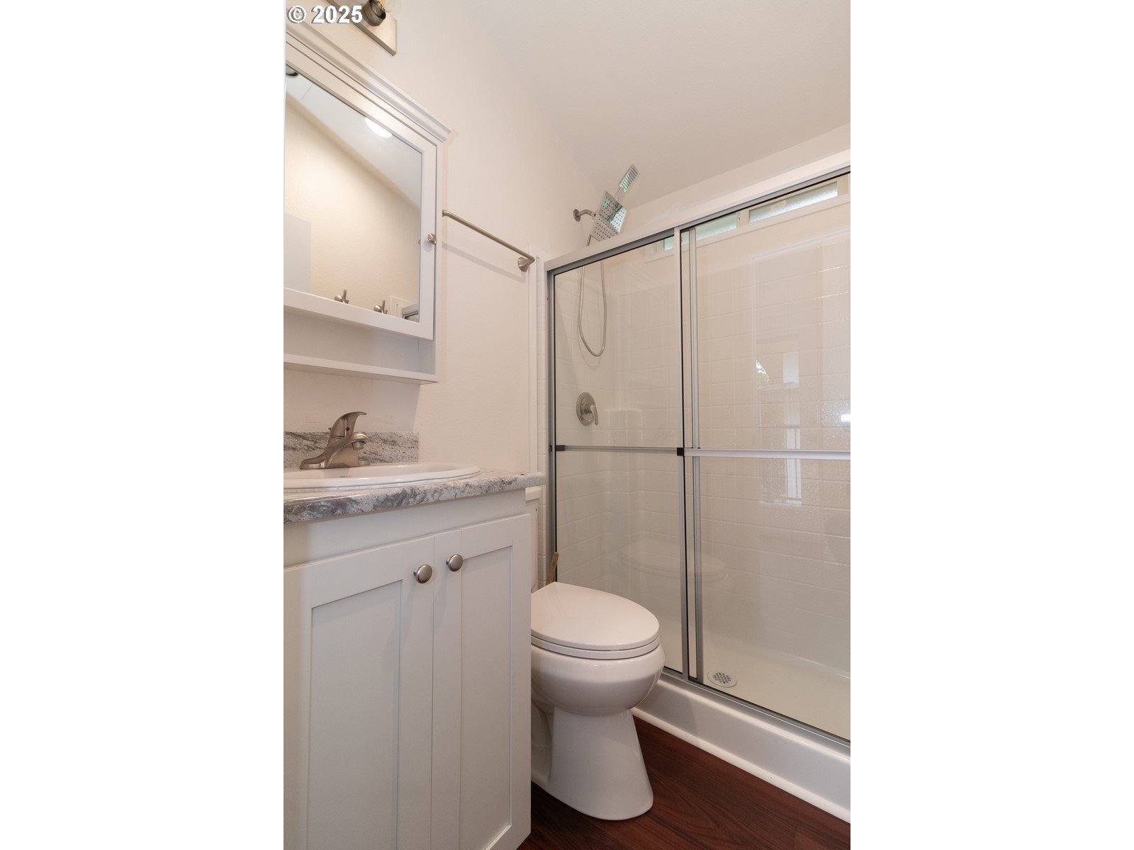231 Horseshoe Bend Florence, OR 97439 - Photo 13 of 26 a bathroom with a granite countertop sink toilet and shower