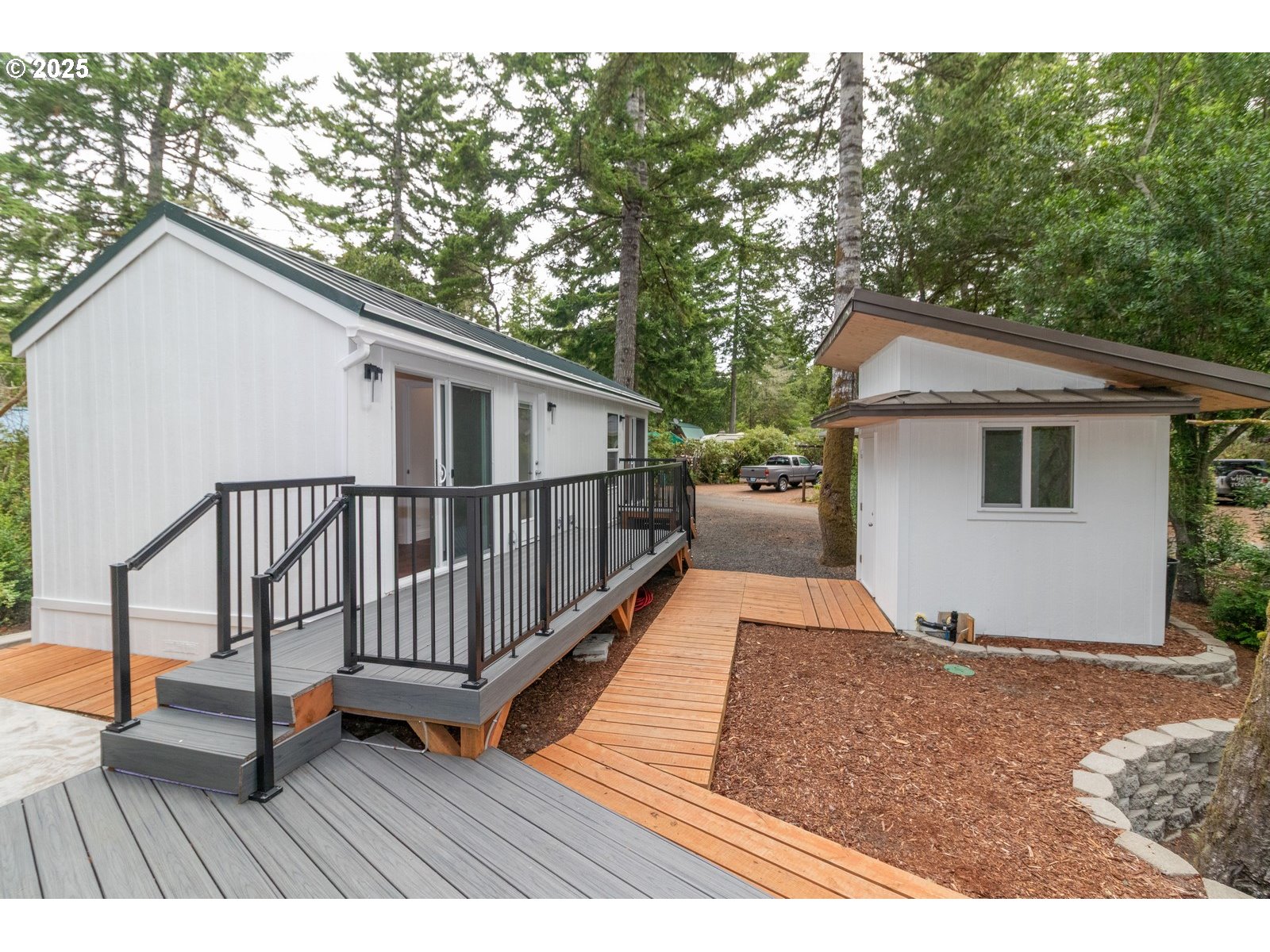 231 Horseshoe Bend Florence, OR 97439 - Photo 15 of 26 a view of backyard with deck and seating space