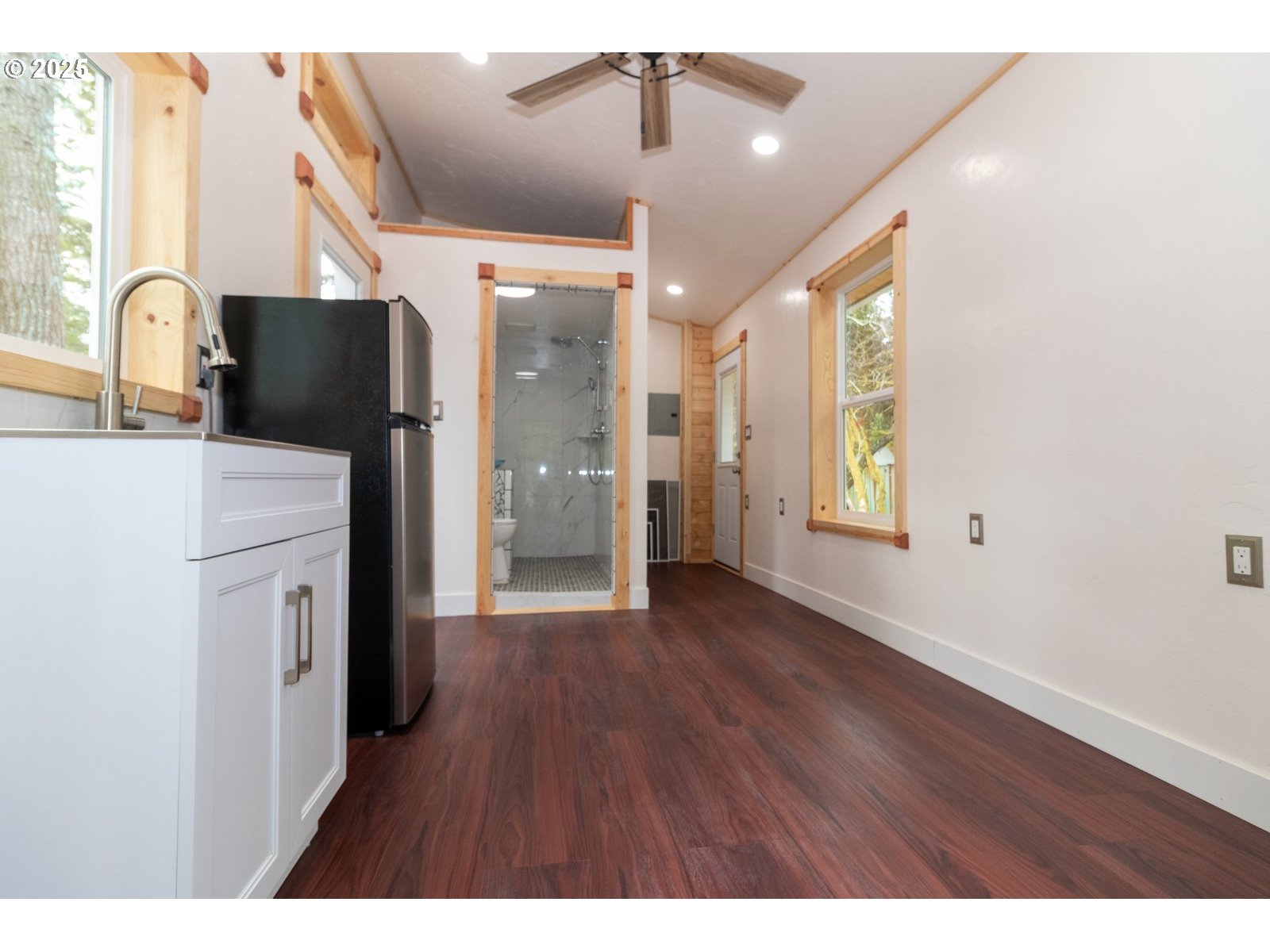 231 Horseshoe Bend Florence, OR 97439 - Photo 18 of 26 a view of kitchen with granite countertop cabinets and wooden floor