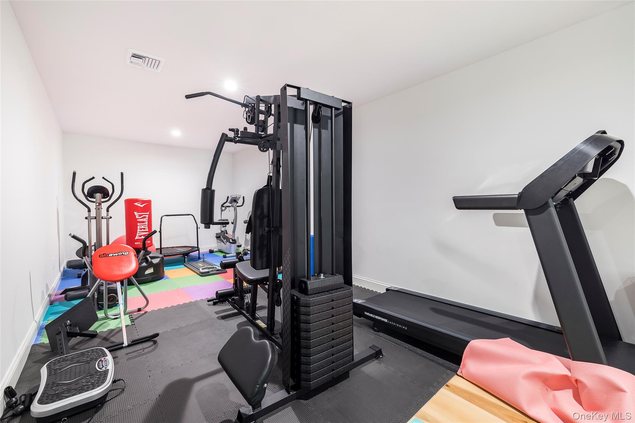 9 Jennifers Path Quiogue, NY 11978 - Photo 24 of 29 Workout area featuring visible vents and baseboards