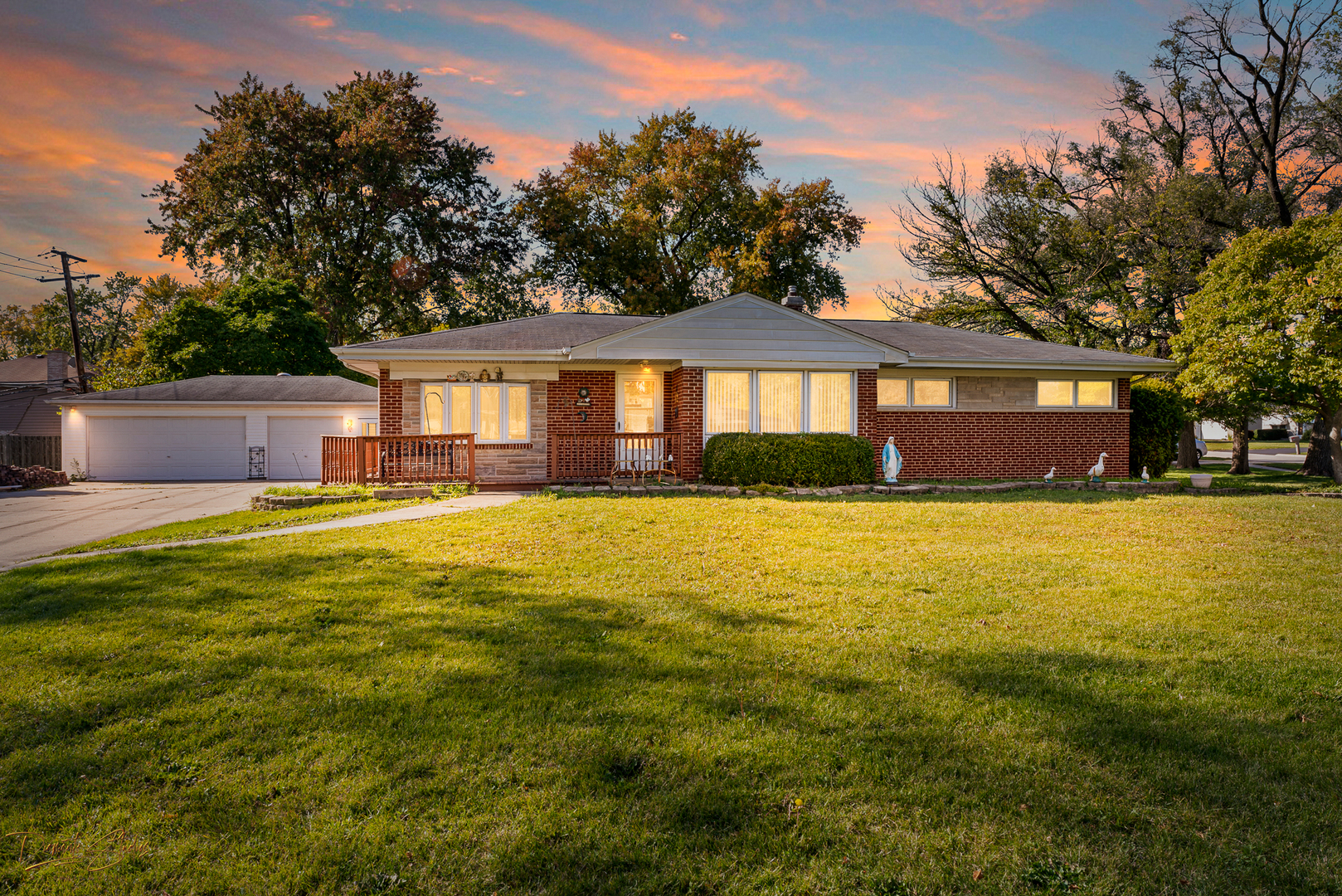 450 Spruce Avenue Bensenville, IL 60106 - Photo 1 of 10 a front view of house with yard and green space