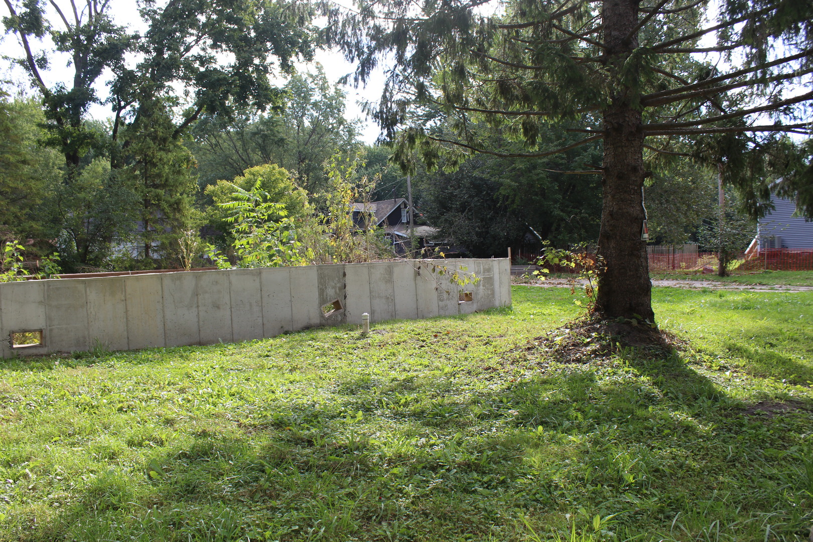 336 Rosedale Drive Lakemoor, IL 60051 - Photo 5 of 7 a garden with trees in front of it