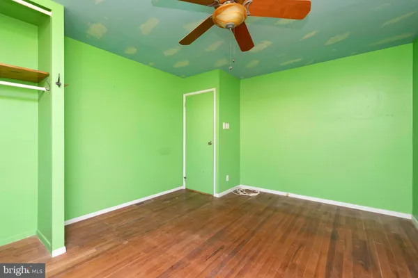 a view of a big room with wooden floor