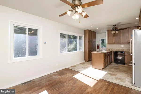 a view of a kitchen with a sink cabinets and window