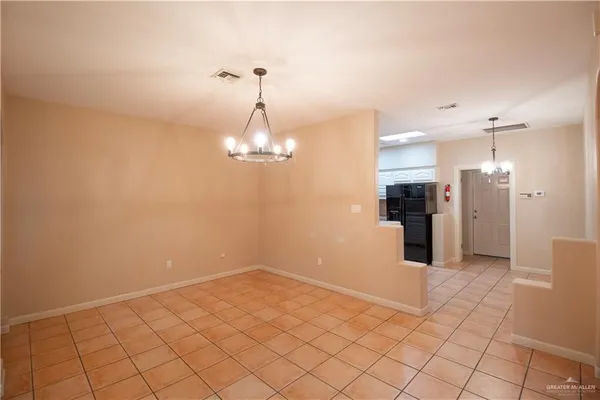a view of a kitchen with a sink