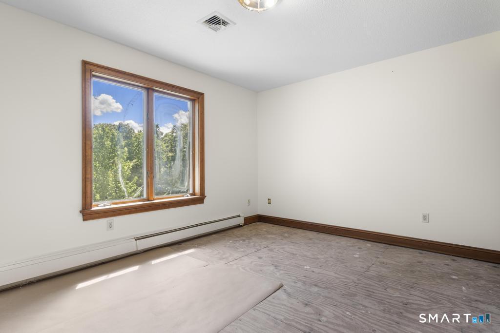 49 Partridge Lane Middletown, CT 06457 - Photo 22 of 39 an empty room with a window