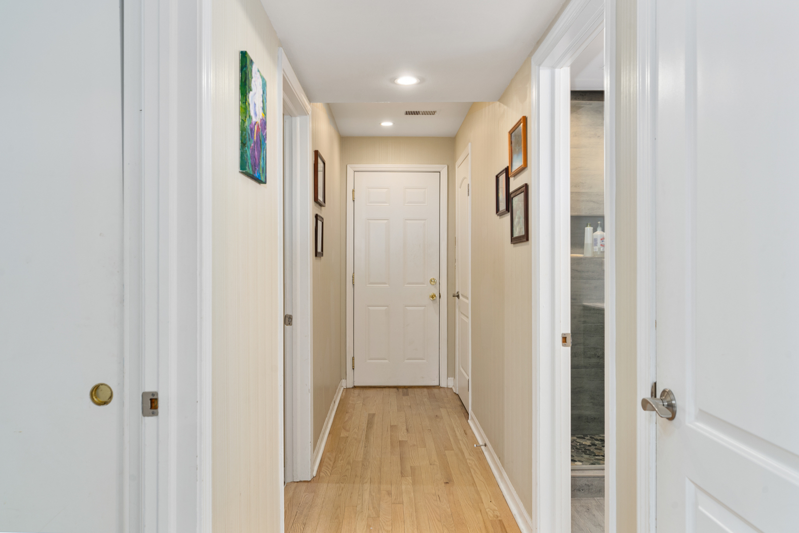 958 Suffield Terrace Northbrook, IL 60062 - Photo 13 of 39 a view of a hallway with wooden floor and closet area