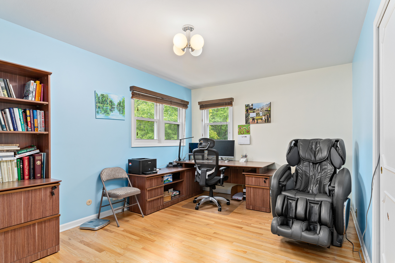 958 Suffield Terrace Northbrook, IL 60062 - Photo 23 of 39 a workspace with furniture bookshelf and a window