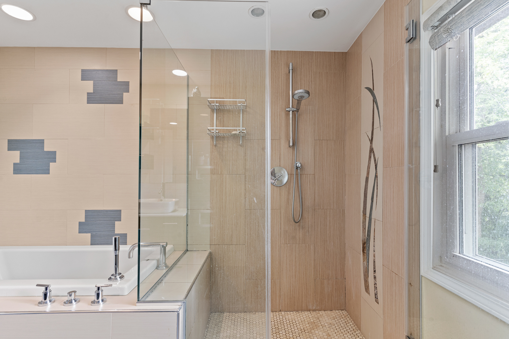 958 Suffield Terrace Northbrook, IL 60062 - Photo 34 of 39 a bathroom with a shower and a sink