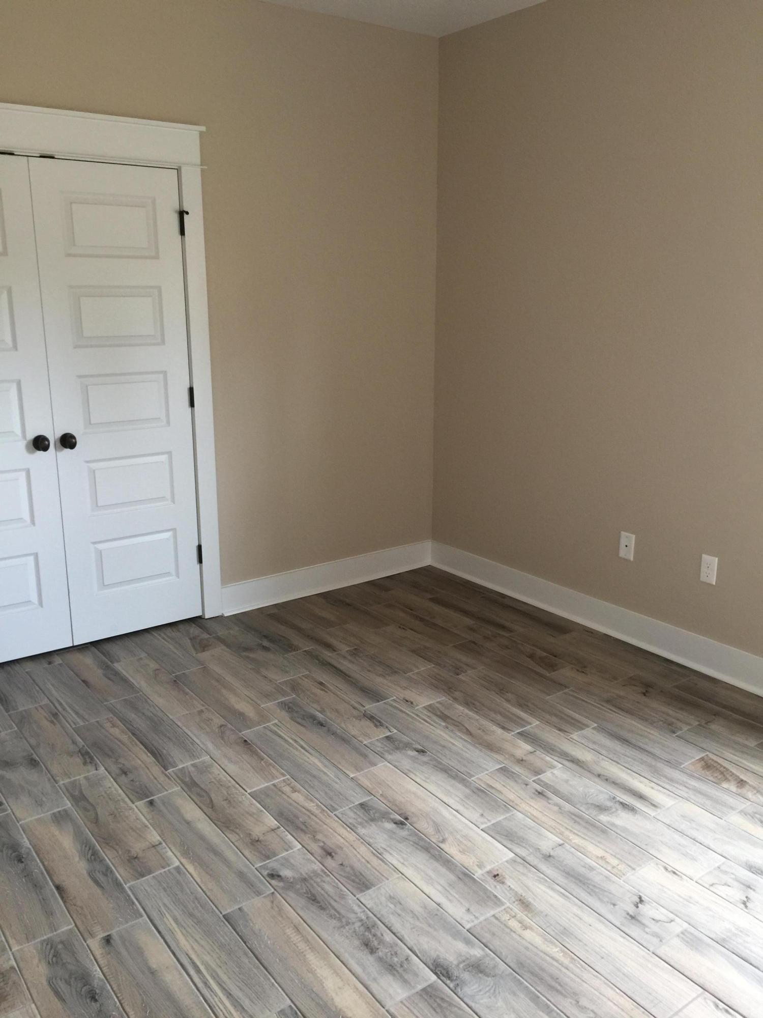 4086 Happy Trails Road Crestview, FL 32539 - Photo 14 of 15 a view of empty room with wooden floor