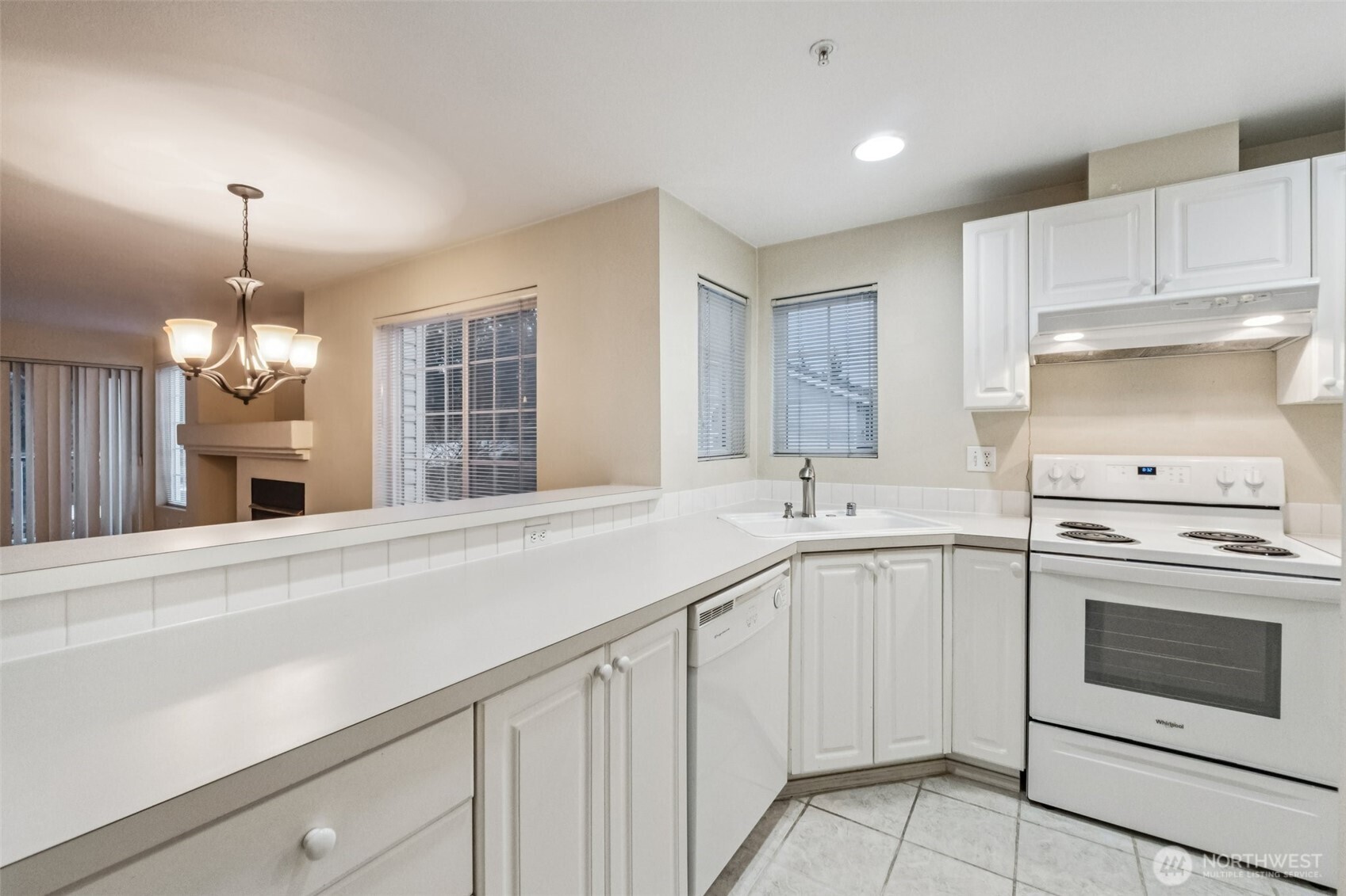 12505 4th Avenue West, Unit 2040 Everett, WA 98204 - Photo 6 of 22 a kitchen with a sink and stove