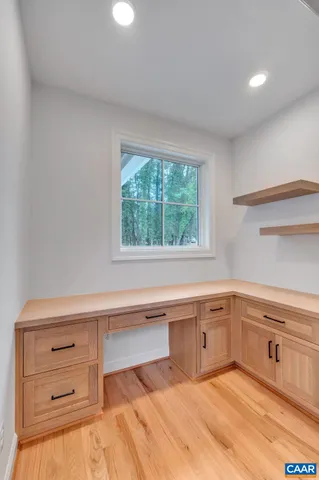 a view of a kitchen with furniture and a window
