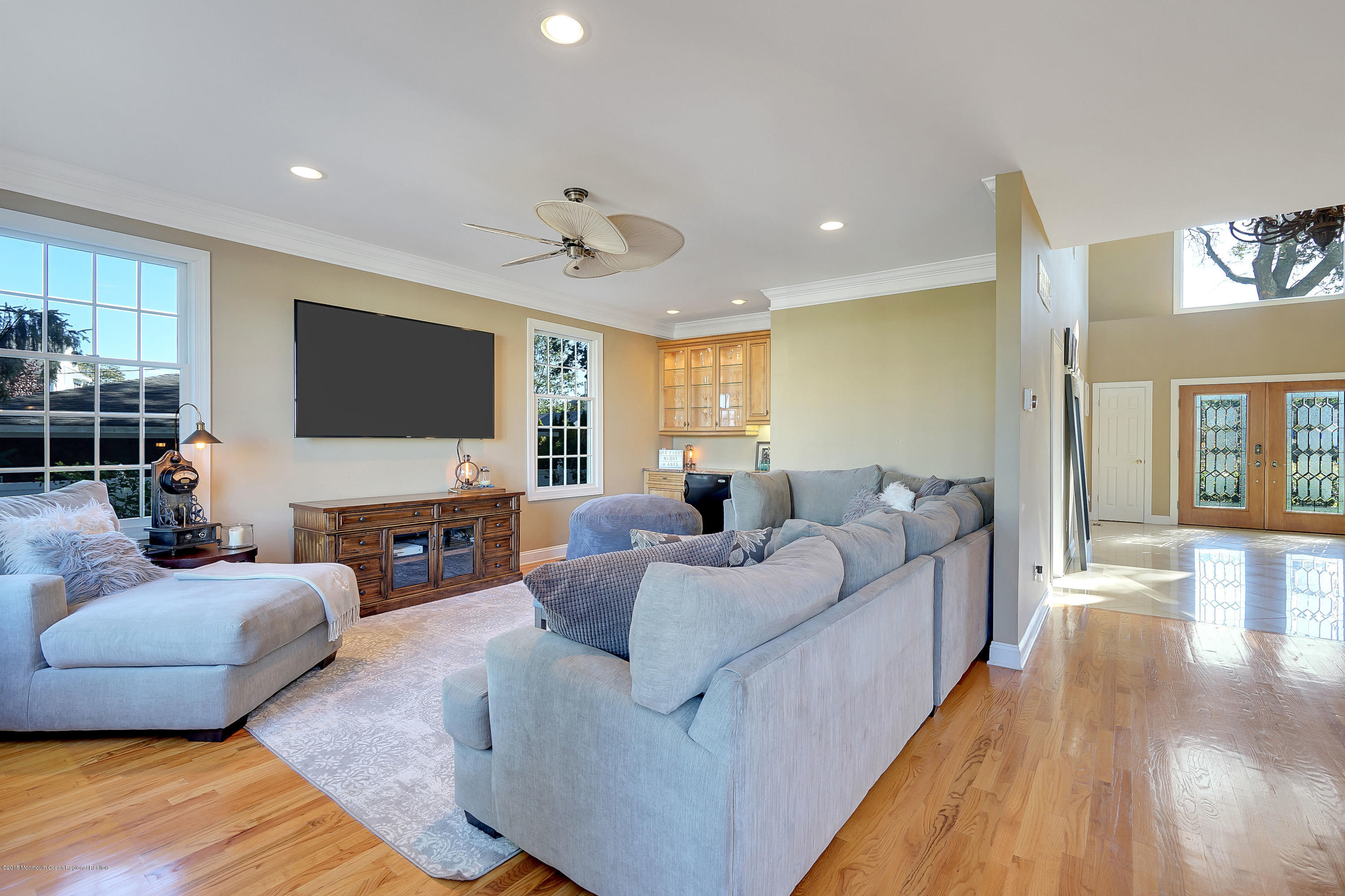 3305A River Road, Unit B Point Pleasant, NJ 08742 - Photo 14 of 56 a living room with furniture and a flat screen tv