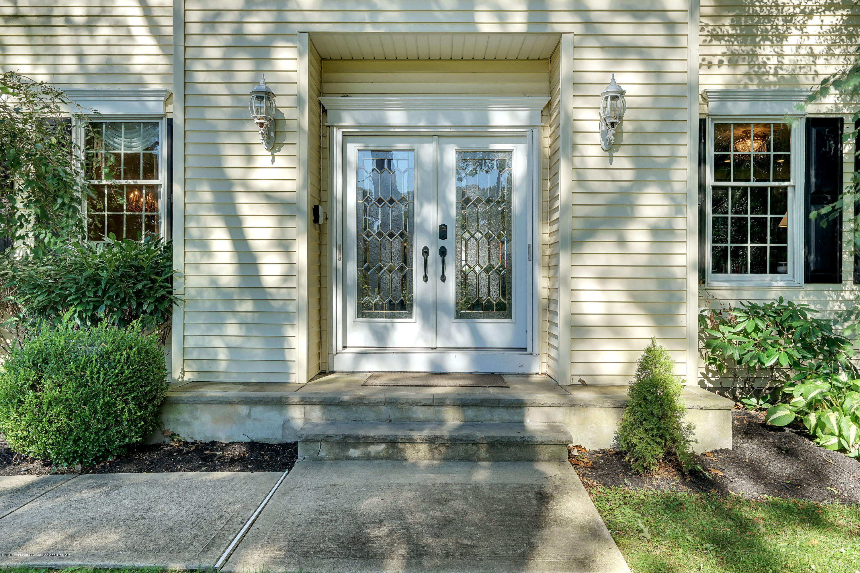 3305A River Road, Unit B Point Pleasant, NJ 08742 - Photo 3 of 56 a view of a brick house with a yard