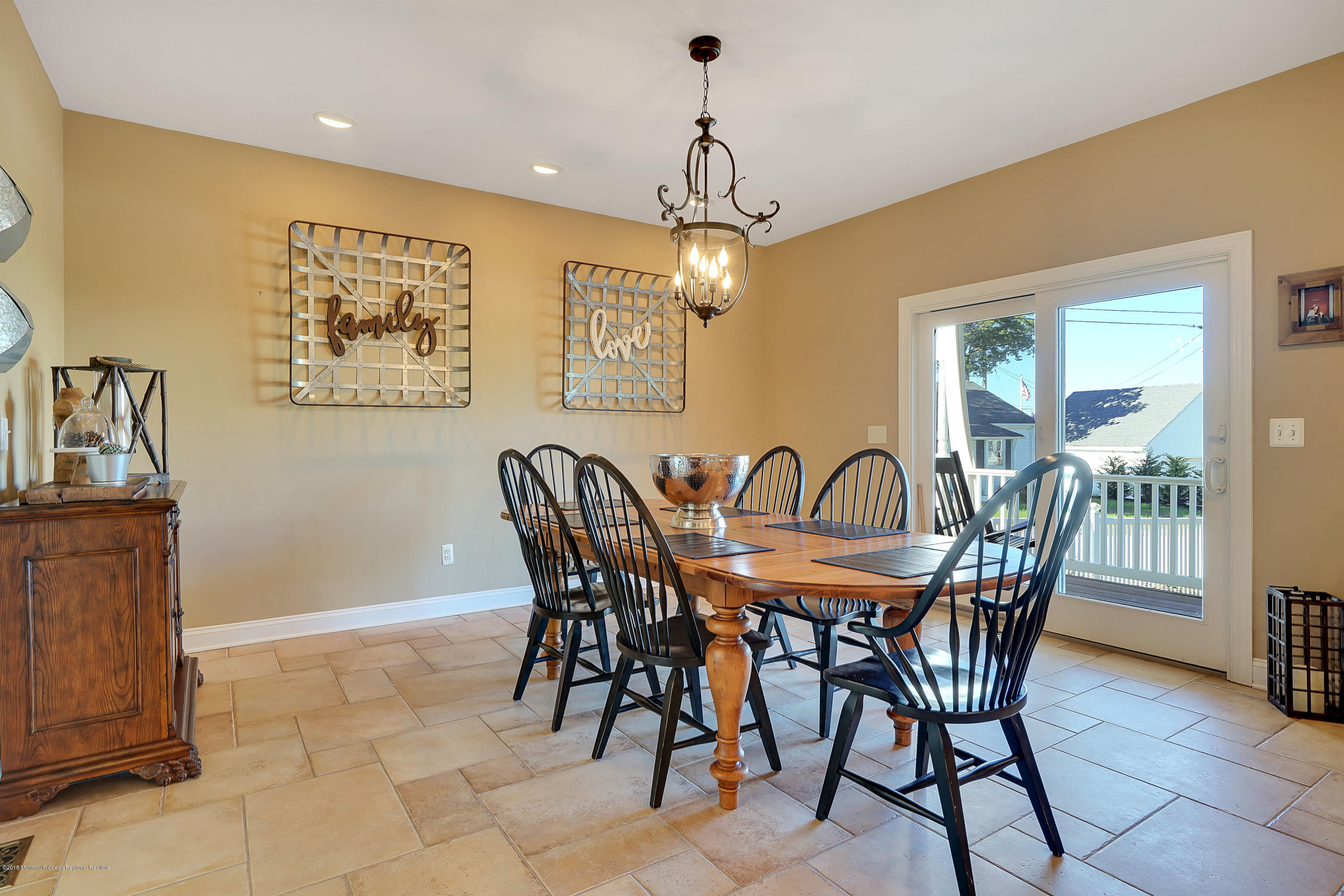 3305A River Road, Unit B Point Pleasant, NJ 08742 - Photo 22 of 56 a view of a dining room with furniture window and outside view