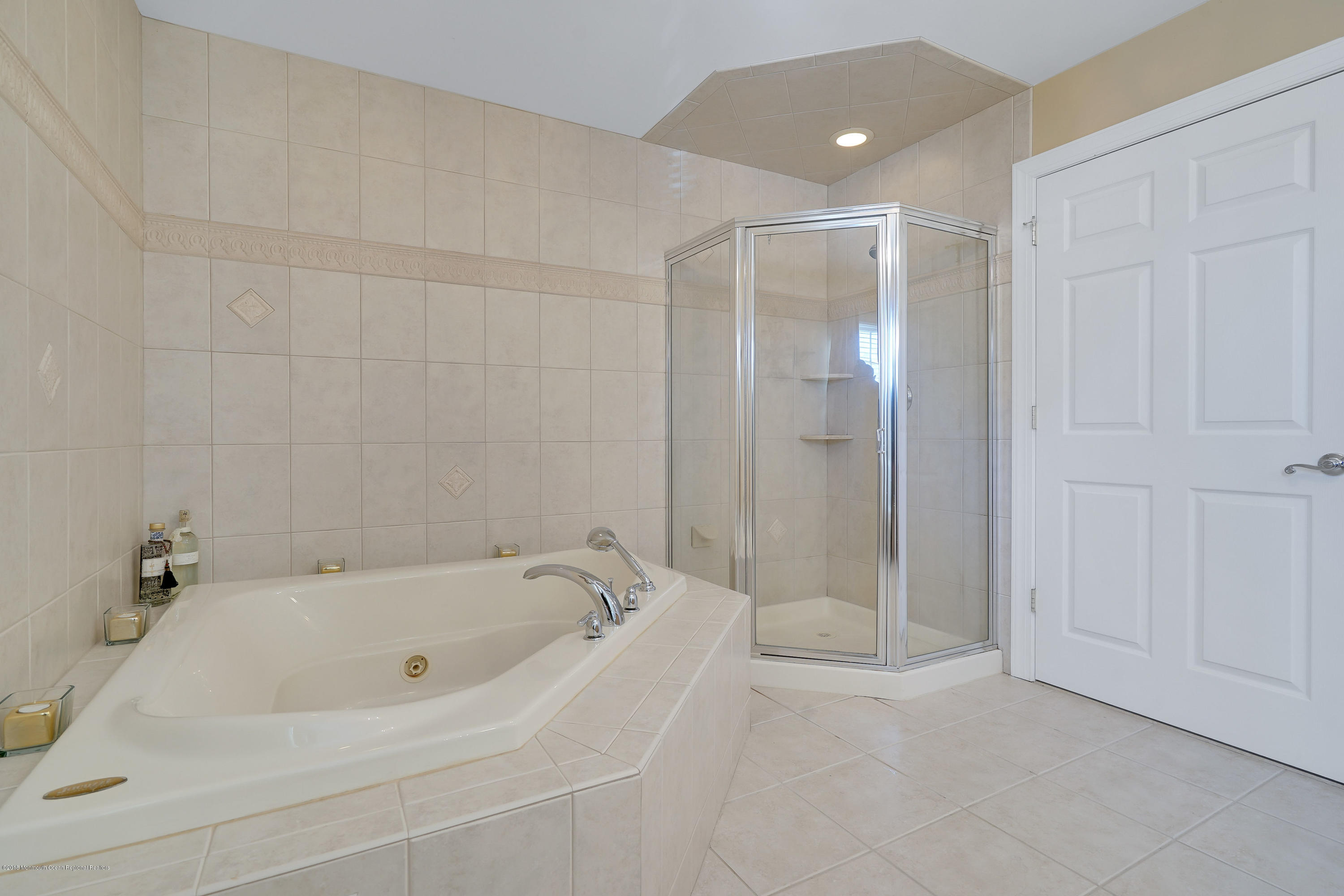 3305A River Road, Unit B Point Pleasant, NJ 08742 - Photo 42 of 56 a bathroom with a bathtub and shower