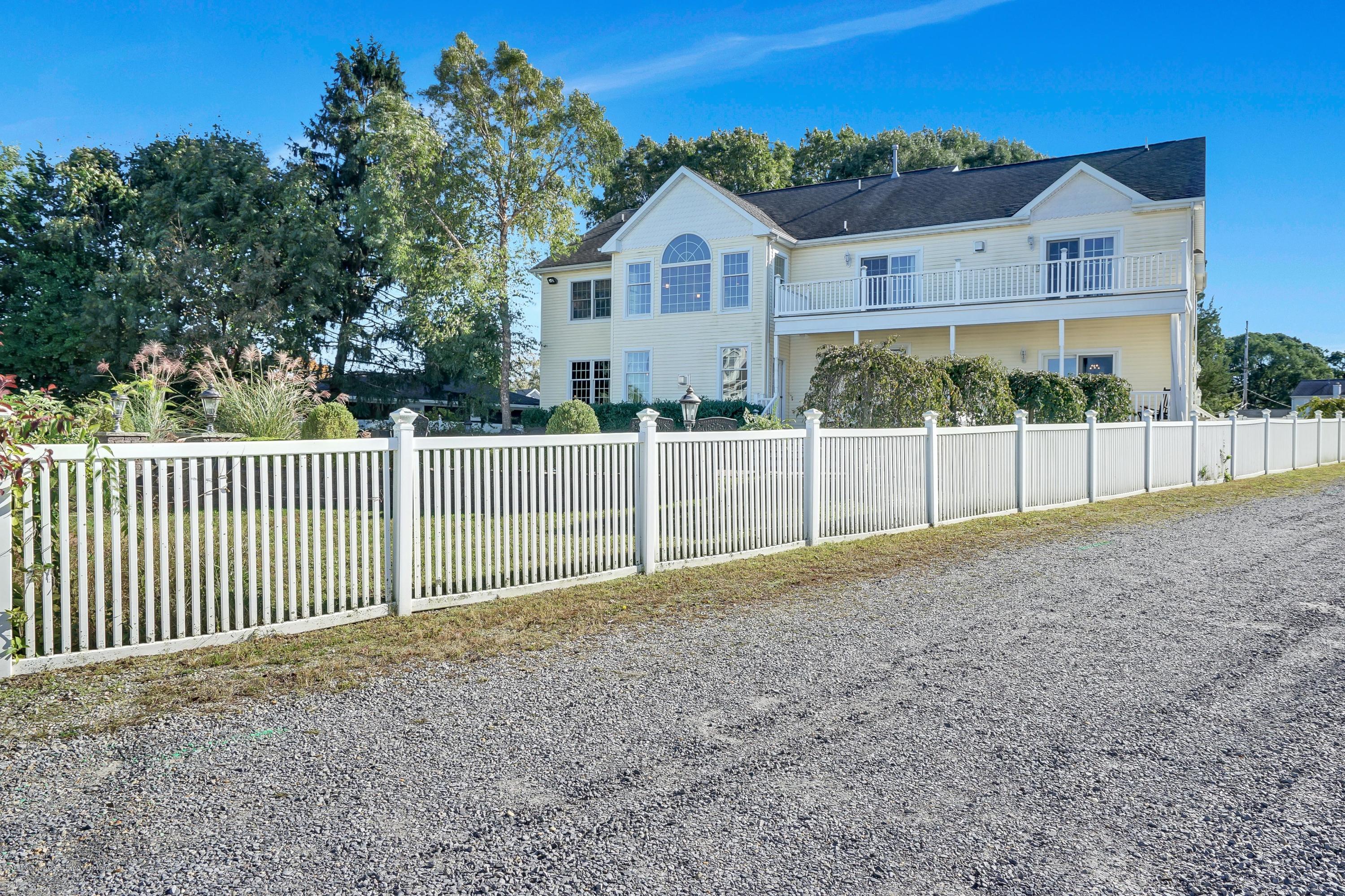 3305A River Road, Unit B Point Pleasant, NJ 08742 - Photo 50 of 56 a view of a house with a backyard and fence