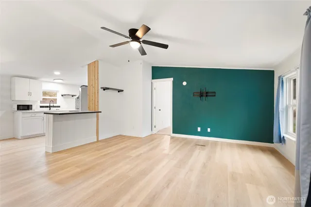 a view of a kitchen with a sink and a kitchen