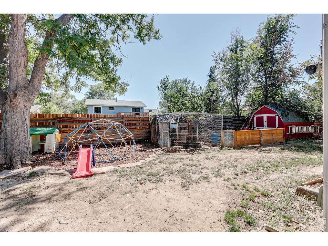 1130 2nd Street Road Eaton, CO 80615 - Photo 33 of 34 The property also includes a chicken coop, storage building and raised garden beds.