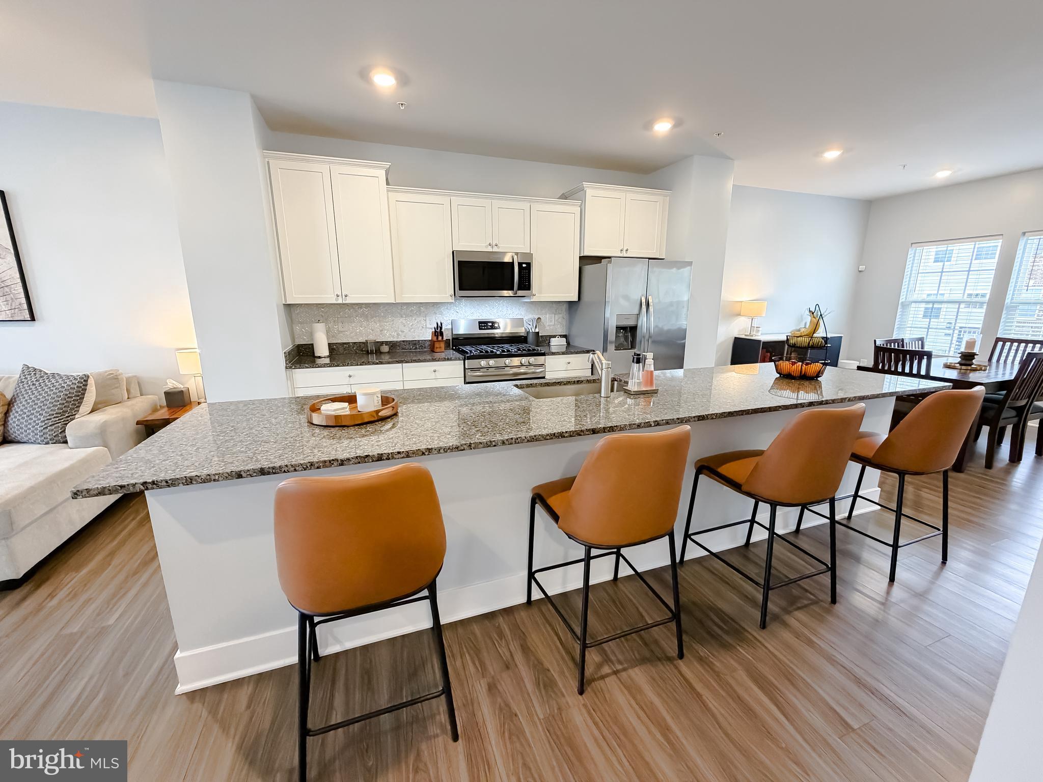 23658 Crosswinds Way California, MD 20619 - Photo 21 of 54 Granite Countertops with 4'' Backsplash