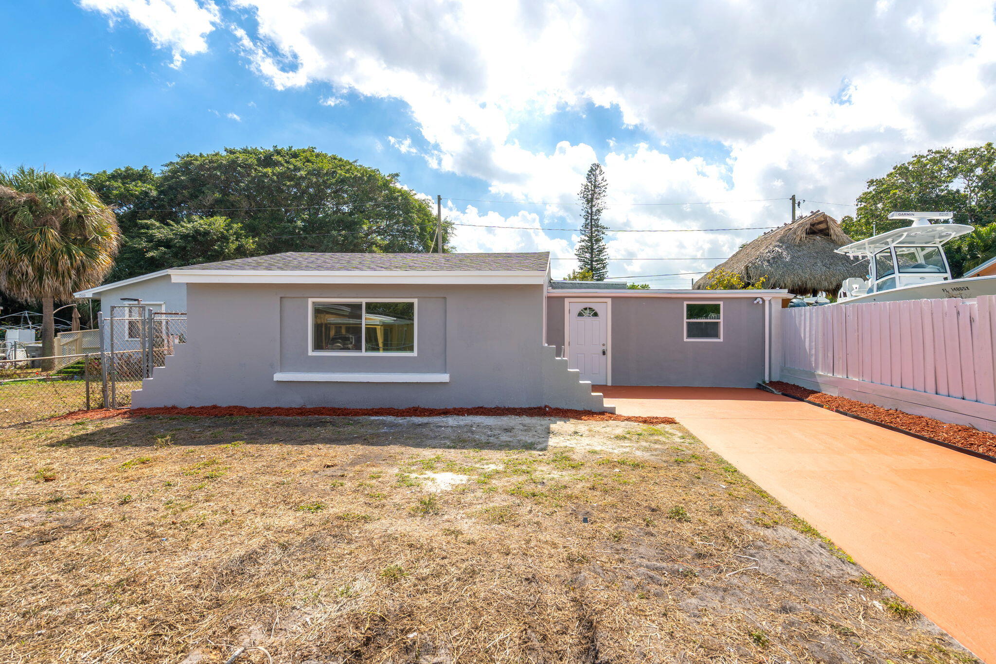 1206 South Ridge Road Lake Worth, FL 33462 - Photo 1 of 37 1-web-or-mls-1206SRidge-2