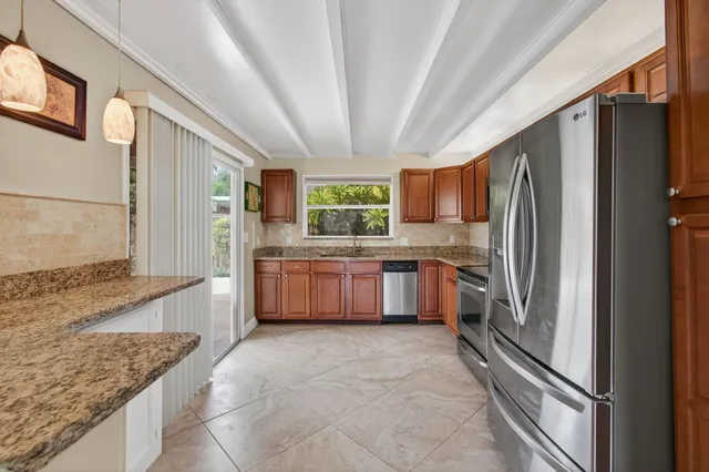 a bedroom with furniture and a wooden floor