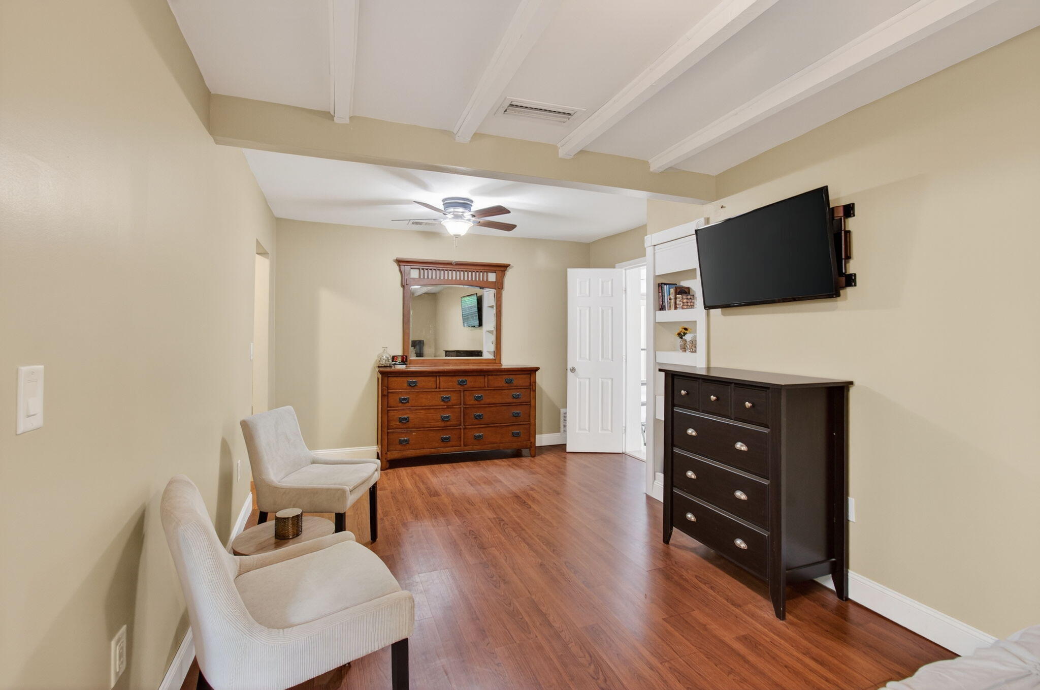 2841 Northeast 8th Terrace Pompano Beach, FL 33064 - Photo 34 of 65 a living room with furniture and a flat screen tv