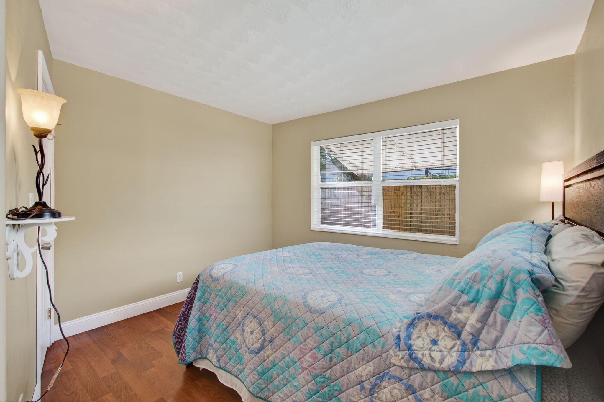 2841 Northeast 8th Terrace Pompano Beach, FL 33064 - Photo 39 of 65 a bedroom with a bed and a window