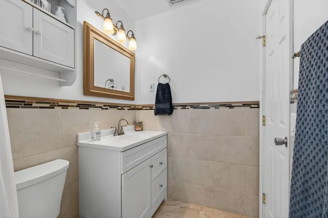 a view of a swimming pool with an outdoor seating