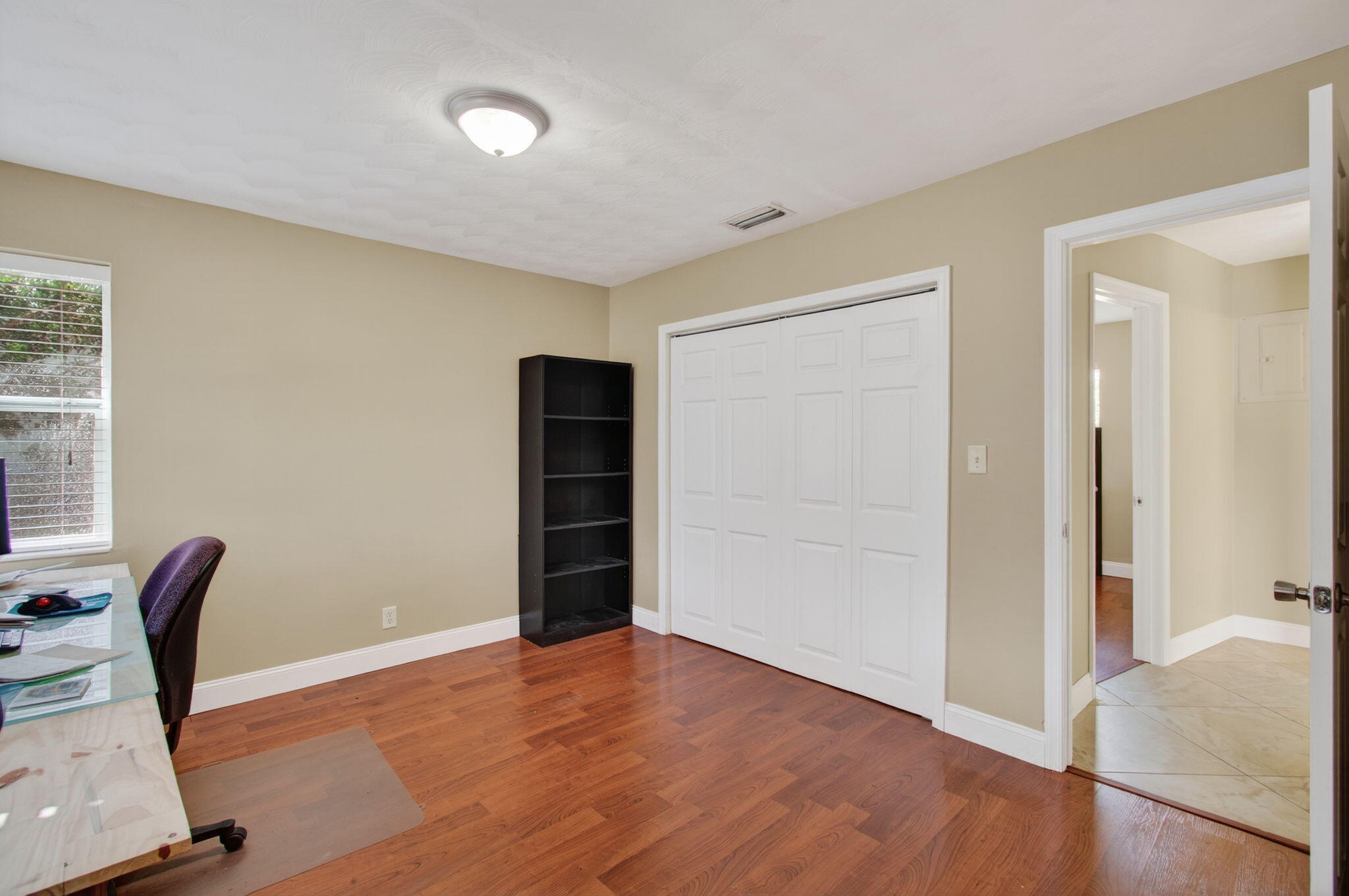 2841 Northeast 8th Terrace Pompano Beach, FL 33064 - Photo 42 of 65 a view of room with hardwood floor and lounge chair