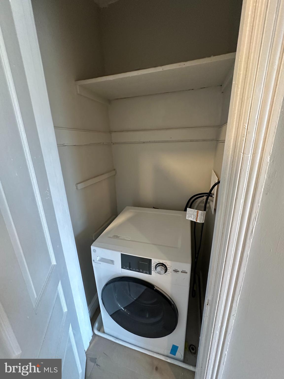 4710 Warrington Avenue, Unit 3 Philadelphia, PA 19143 - Photo 21 of 32 a utility room with a sink and washing machine