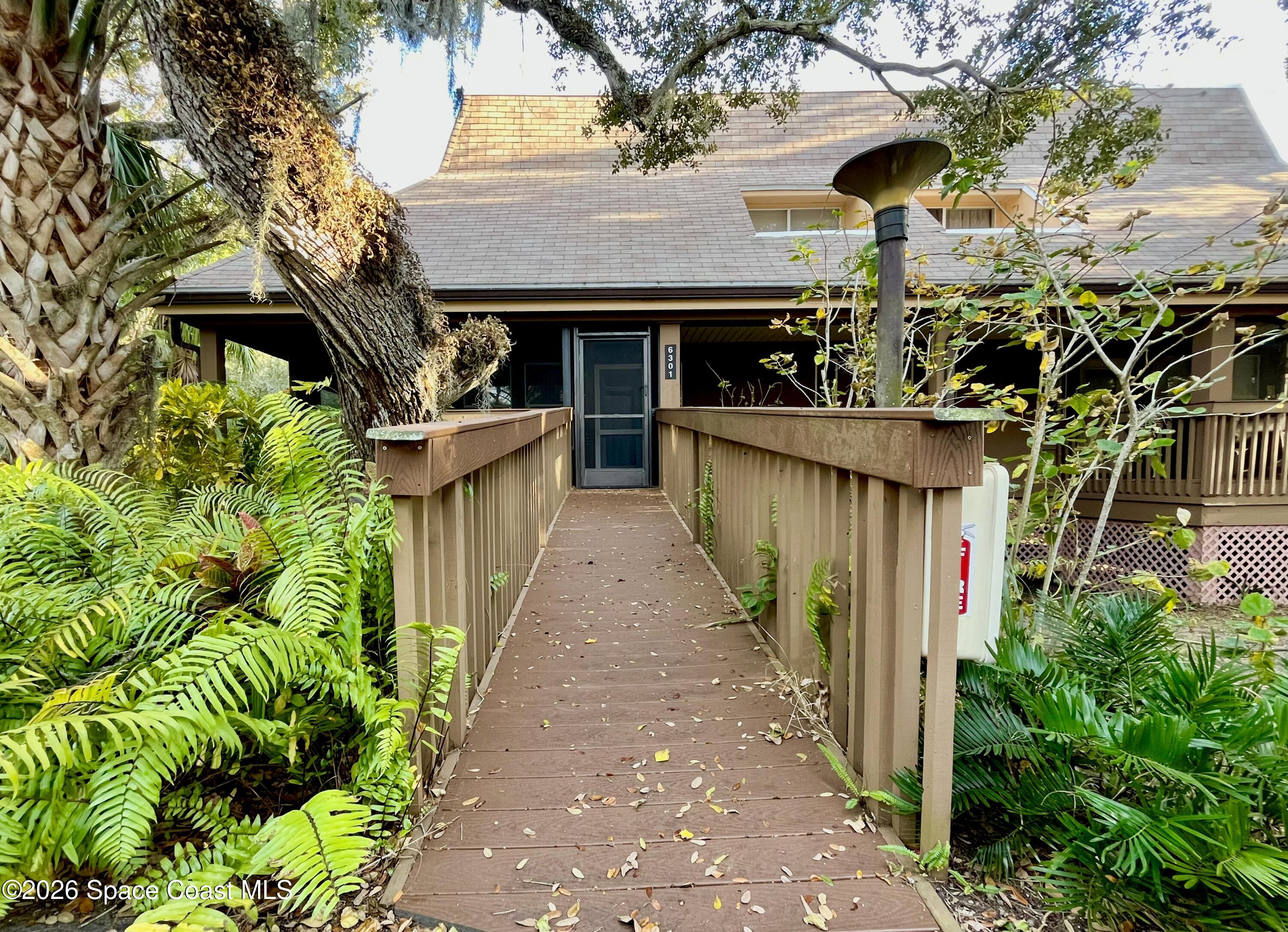 6301 Treetop Drive Melbourne Beach, FL 32951 - Photo 1 of 21 IMG_0979