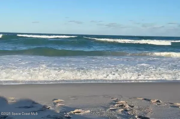 a view of room with wooden floor
