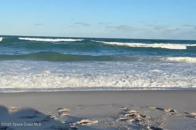 a view of room with wooden floor