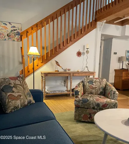 a living room with furniture and a couch