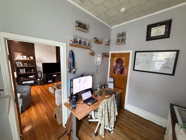 a view of a living room and dining room