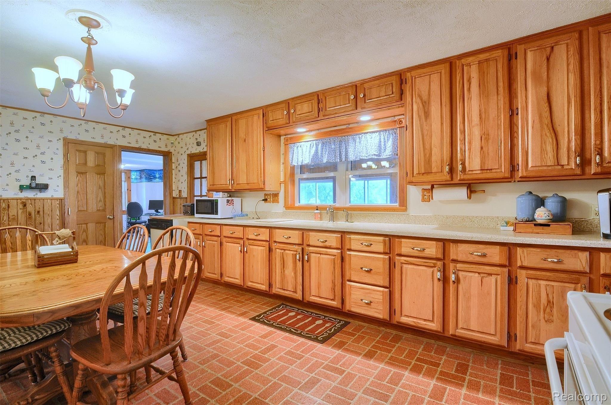 8280 Farley Road Pinckney, MI 48169 - Photo 11 of 39 11-Kitchen 3rd View.jpg