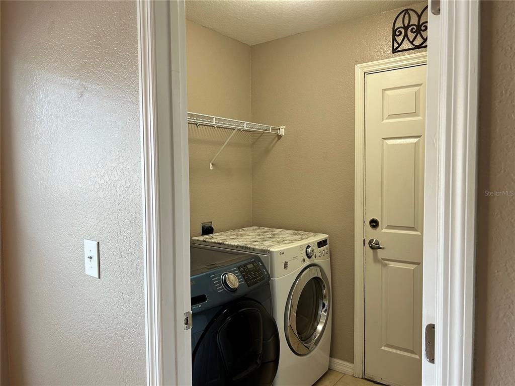 1230 Legatto Loop Dundee, FL 33838 - Photo 32 of 38 Laundry Room