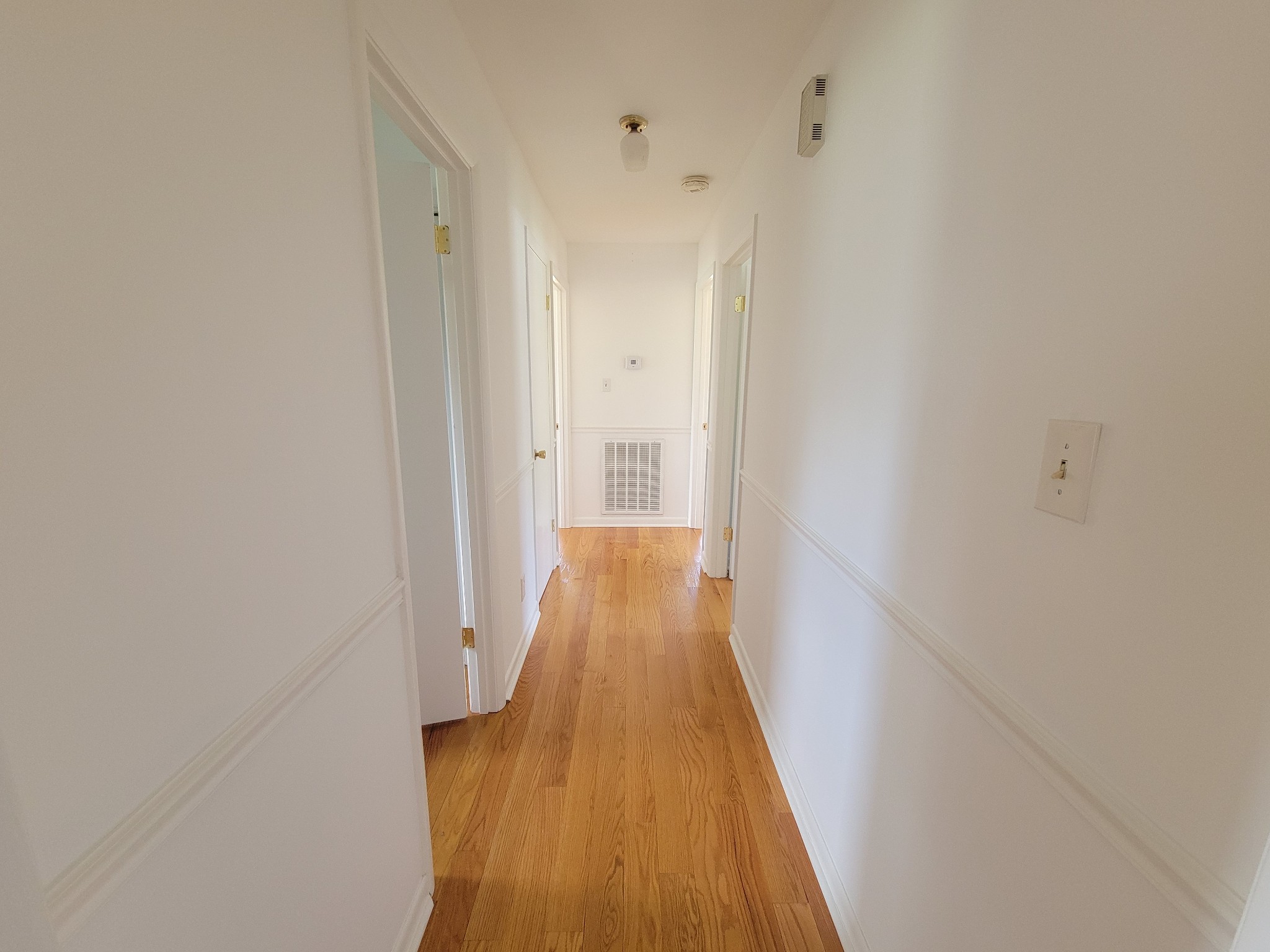 1205 Beverly Drive Pulaski, TN 38478 - Photo 12 of 27 a view of a bathroom with a sink and wooden floor